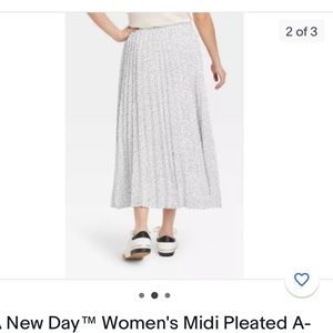 Polka dot pleated midi skirt. New with tags.size XL